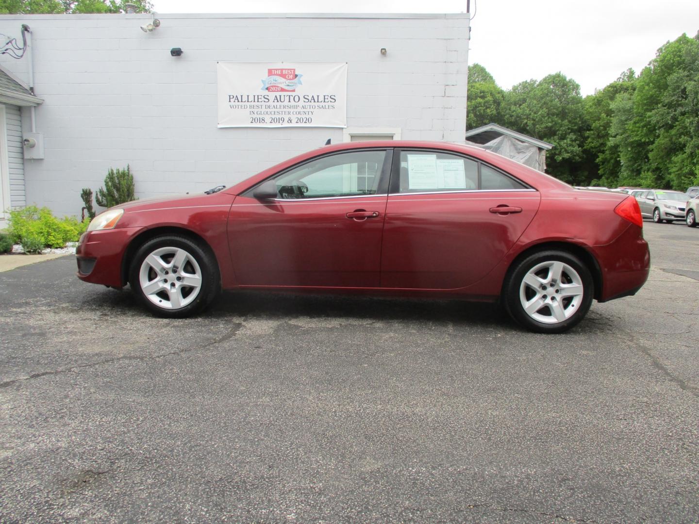 2009 RED Pontiac G6 Sedan (1G2ZJ57B994) with an 2.4L L4 DOHC 16V engine, 4-Speed Automatic transmission, located at 540a Delsea Drive, Sewell, NJ, 08080, (856) 589-6888, 39.752560, -75.111206 - Photo#2